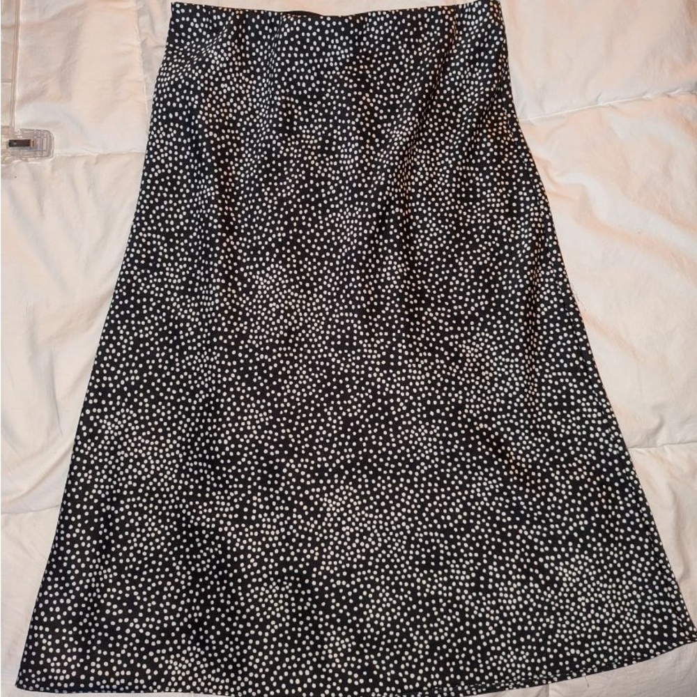Loft brand with elastic waist. Very silky and great for business attire.